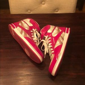 Size 11 Men's Reebok Fuchsia and Silver high tops.